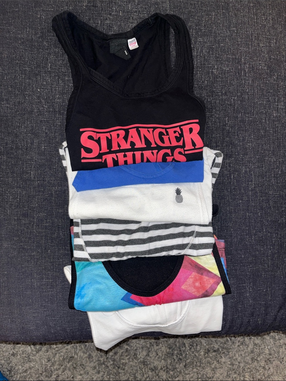 6-pack Graphic Tank Top for men. Fits size small.